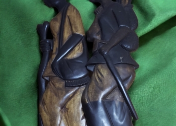 ARM-AFRICAN WOOD CARVING OF FARMER