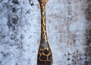 ARM-WOOD CARVING OF A GIRAFFE